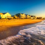 Oceanfront beach houses along Edisto Beach at sunset
