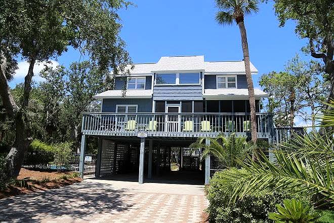 Three-story raised vacation home with decks on Edisto Island