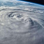 Satellite view of a hurricane spiraling over the Atlantic