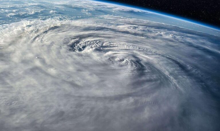 Satellite view of a hurricane spiraling over the Atlantic